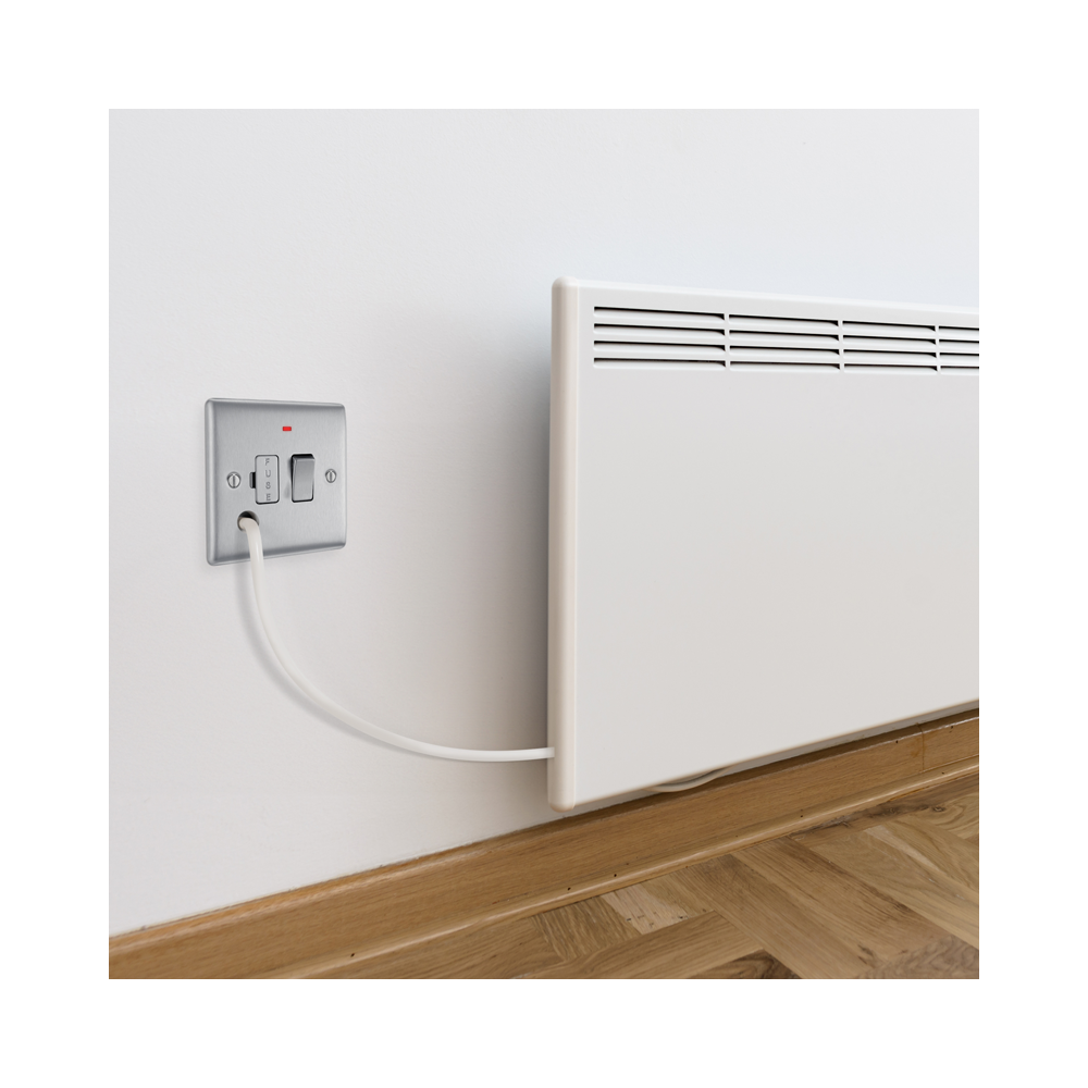 Metallic light switch with two toggle switches on a white background wall setting
