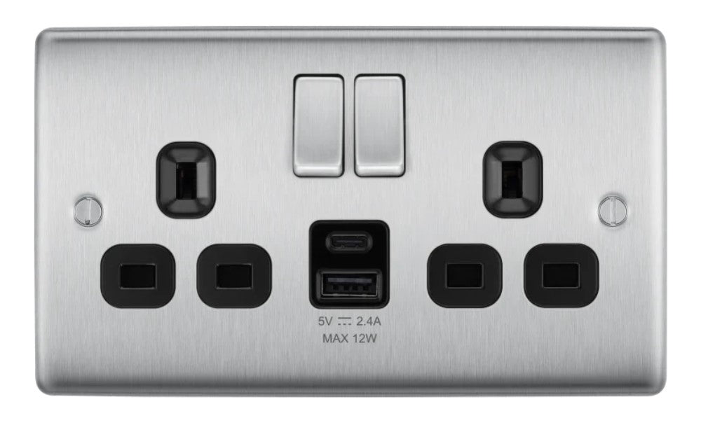 A silver double USB socket with brushed steel finish and black inserts for the ports.
