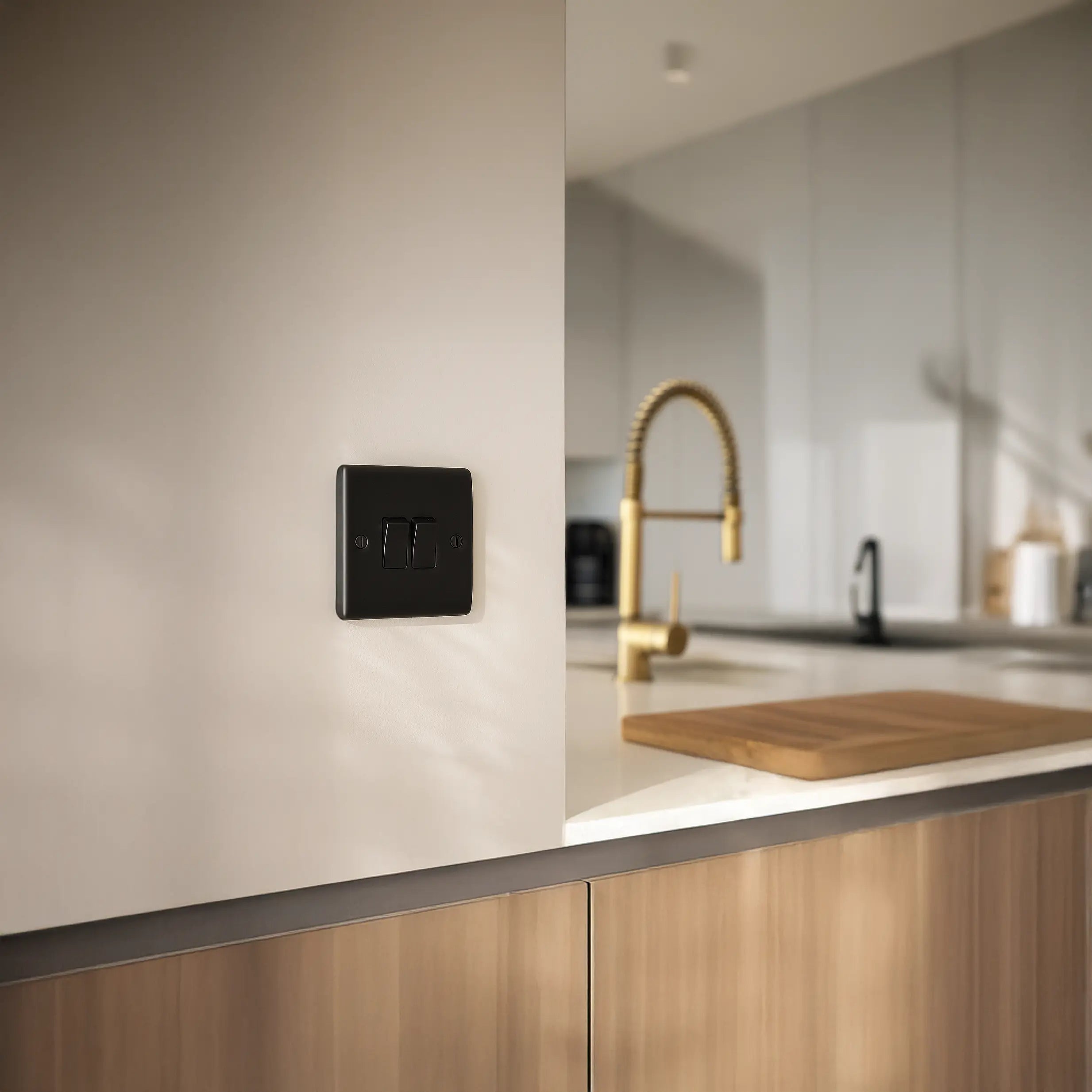 matt black nexus 2 gang switch in kitchen setting