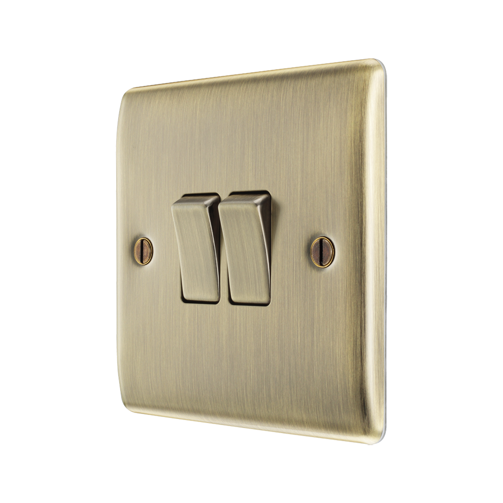 BG Nexus Metal Antique Brass 2G Intermediate Light Switch NAB2GINT – angled front view