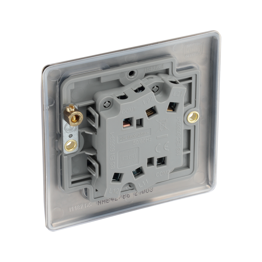 The back of an electrical switch on a white background
