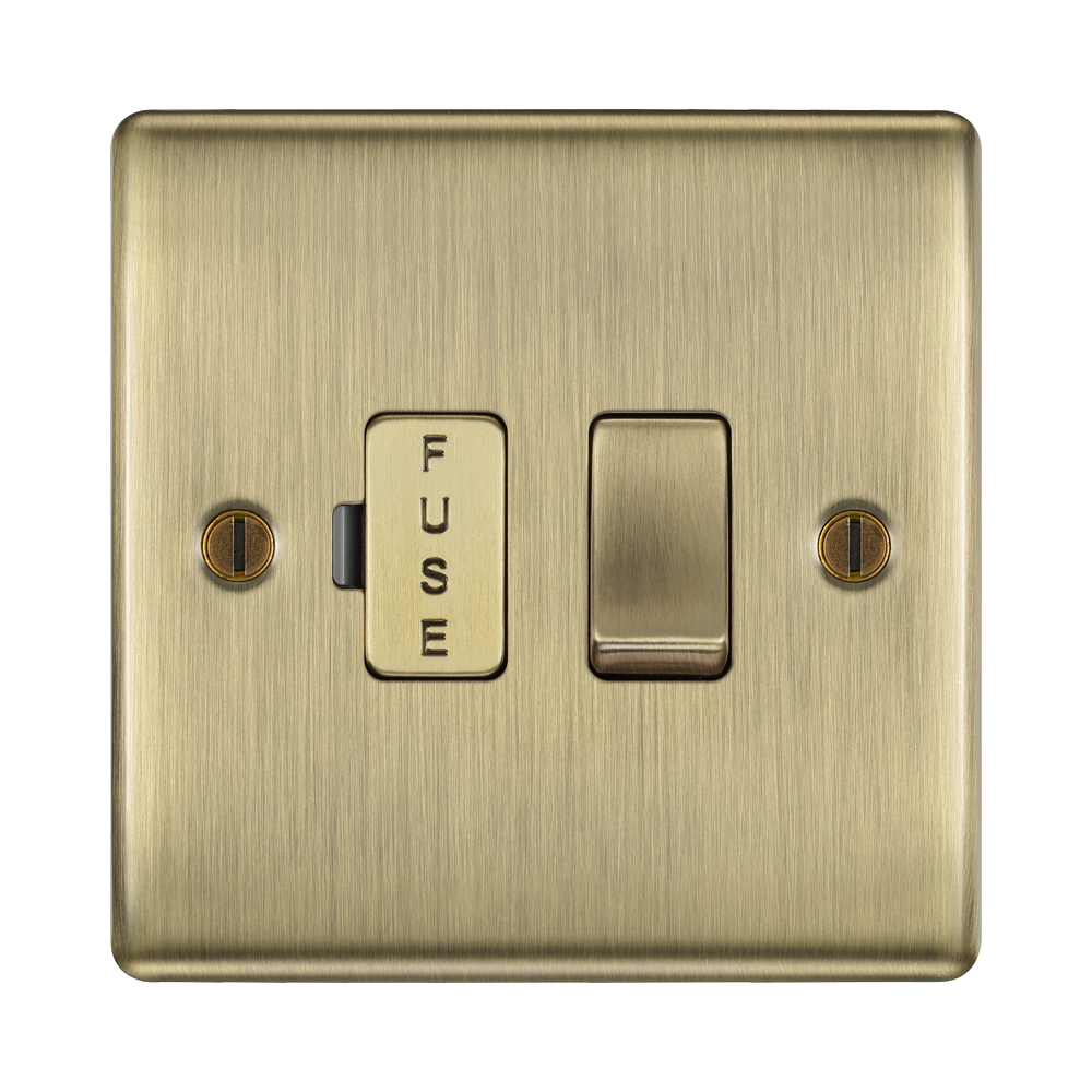 Brass fuse switch on a white background