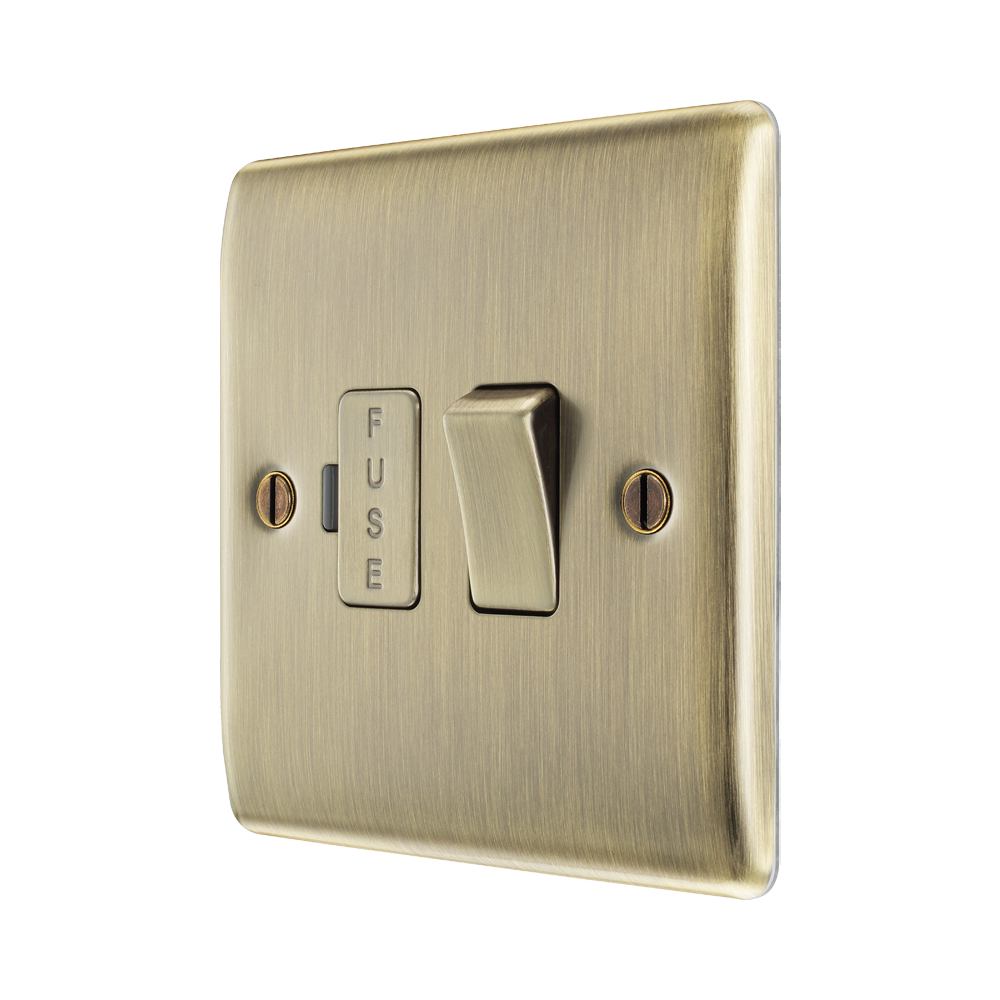 Brass fuse switch on a white background