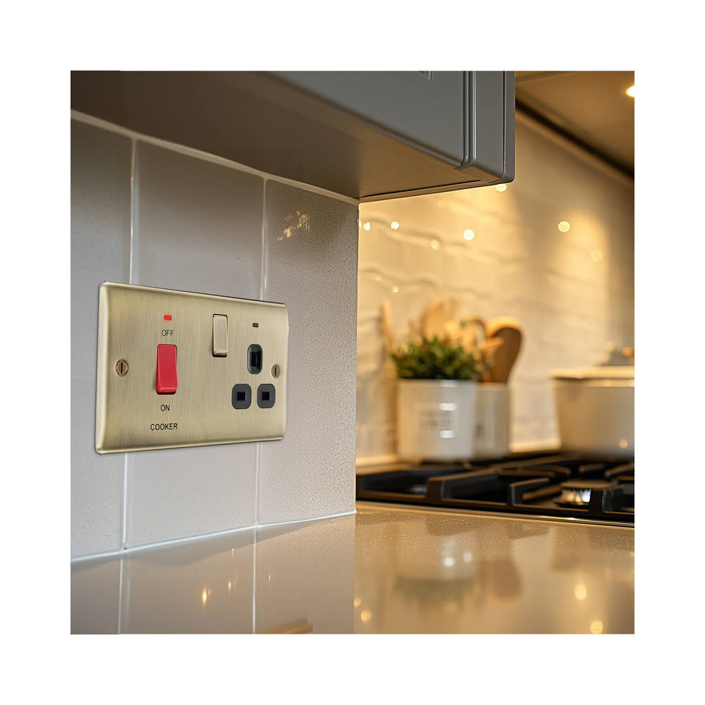 BG Nexus Metal Antique Brass Cooker Switch with Socket installed on an interior wall