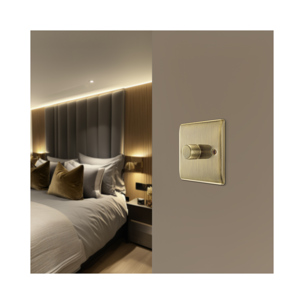 BG Nexus Metal Antique Brass 1-gang Dimmer Switch installed on an interior wall