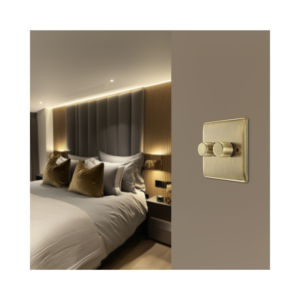 BG Nexus Metal Antique Brass 2-gang Dimmer Switch installed on an interior wall
