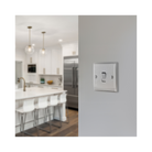 Metallic light switch on a white background kitchen setting