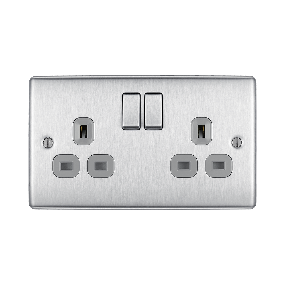 Metallic electrical switch with multiple sockets and switches on a white background