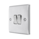 Metallic light switch on a white background side