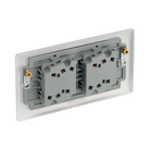Metallic four-switch panel on a white background back