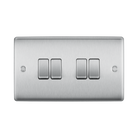 Metallic four-switch panel on a white background
