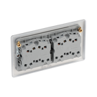 Metallic light switch panel with five rectangular buttons on a white background back
