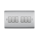 Metallic light switch panel with five rectangular buttons on a white background