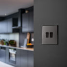 BG Evolve Polycarbonate Black Chrome 2G Light Switch PCDBC42B Available From RS Electrical kitchen interior